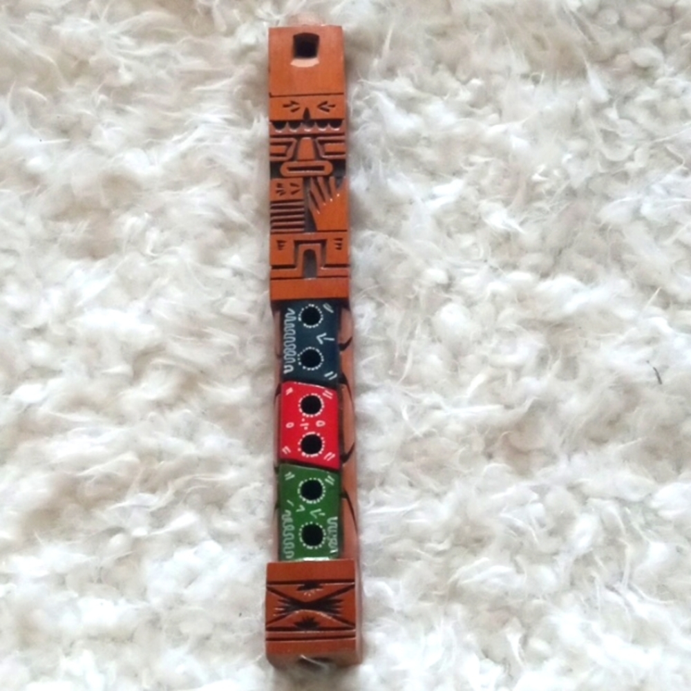 - Tarka handcarved wind instrument